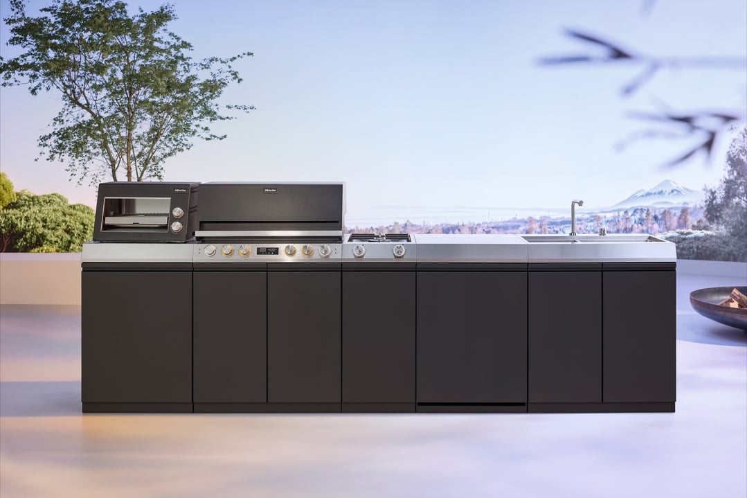 Miele Master Outdoor Kitchen BBQ with oven and sink on an outdoor patio