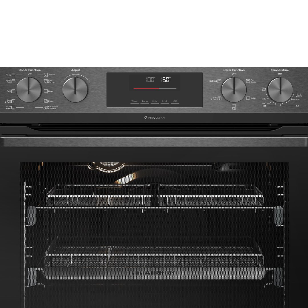 Close up of a black Westinghouse oven with controls and interior racks