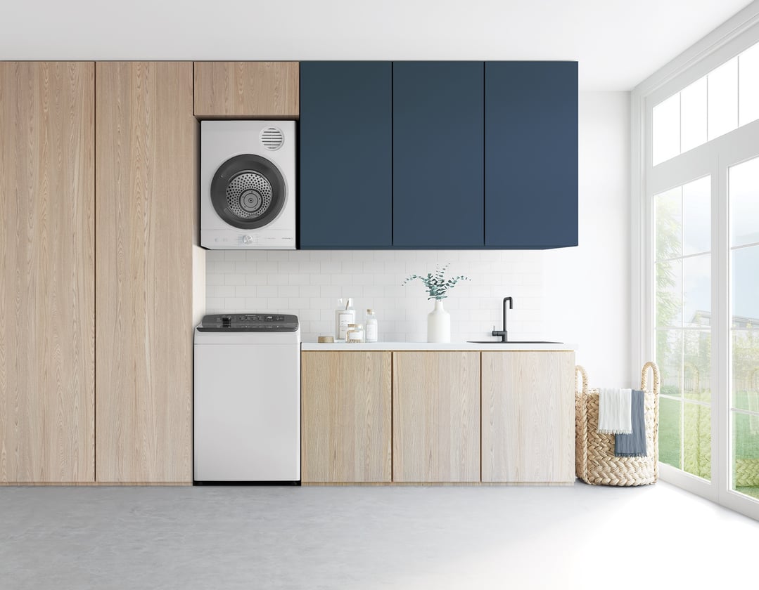 Top load washing machine and dryer in a modern laundry room