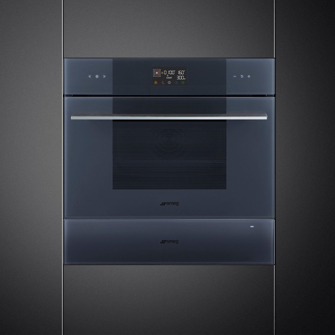 A built-in Neptune Grey Linea Compact Speed Oven with a digital display