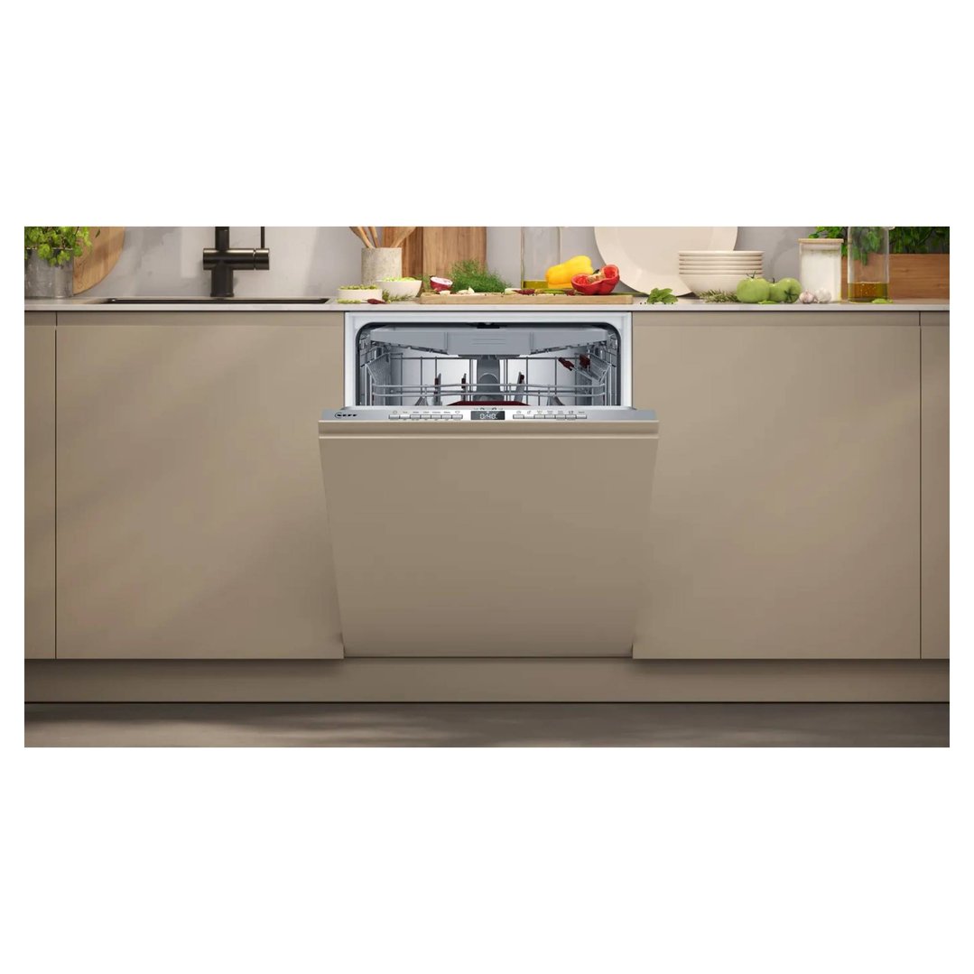 Fully integrated dishwasher with door slightly ajar in a modern kitchen setting