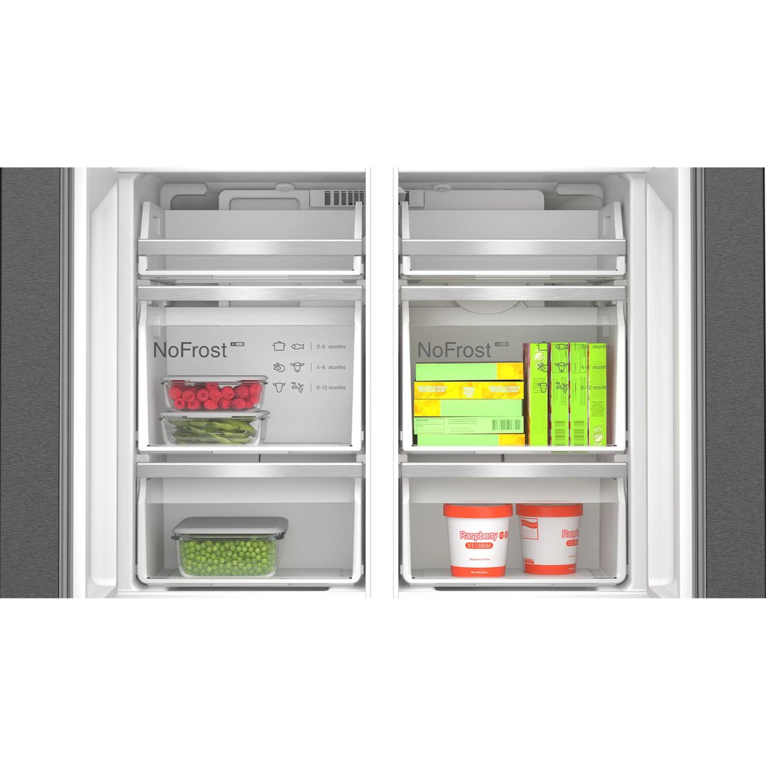 Open multi-door fridge freezer interior with food items on shelves and in drawers