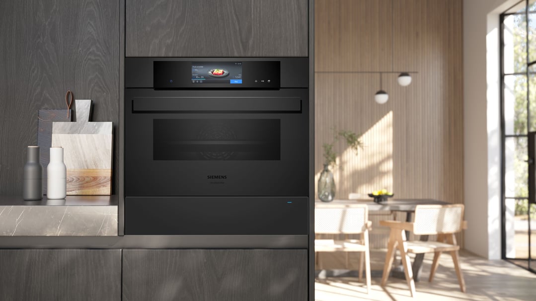 Built-in Siemens warming drawer and oven in a modern kitchen setting