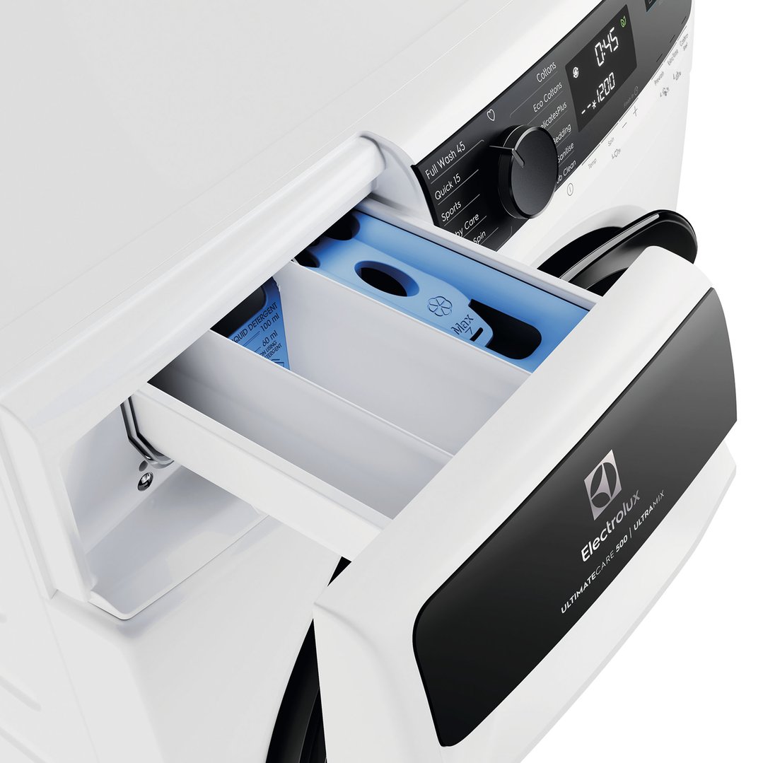 Close up of a white Electrolux washing machine with the detergent drawer open