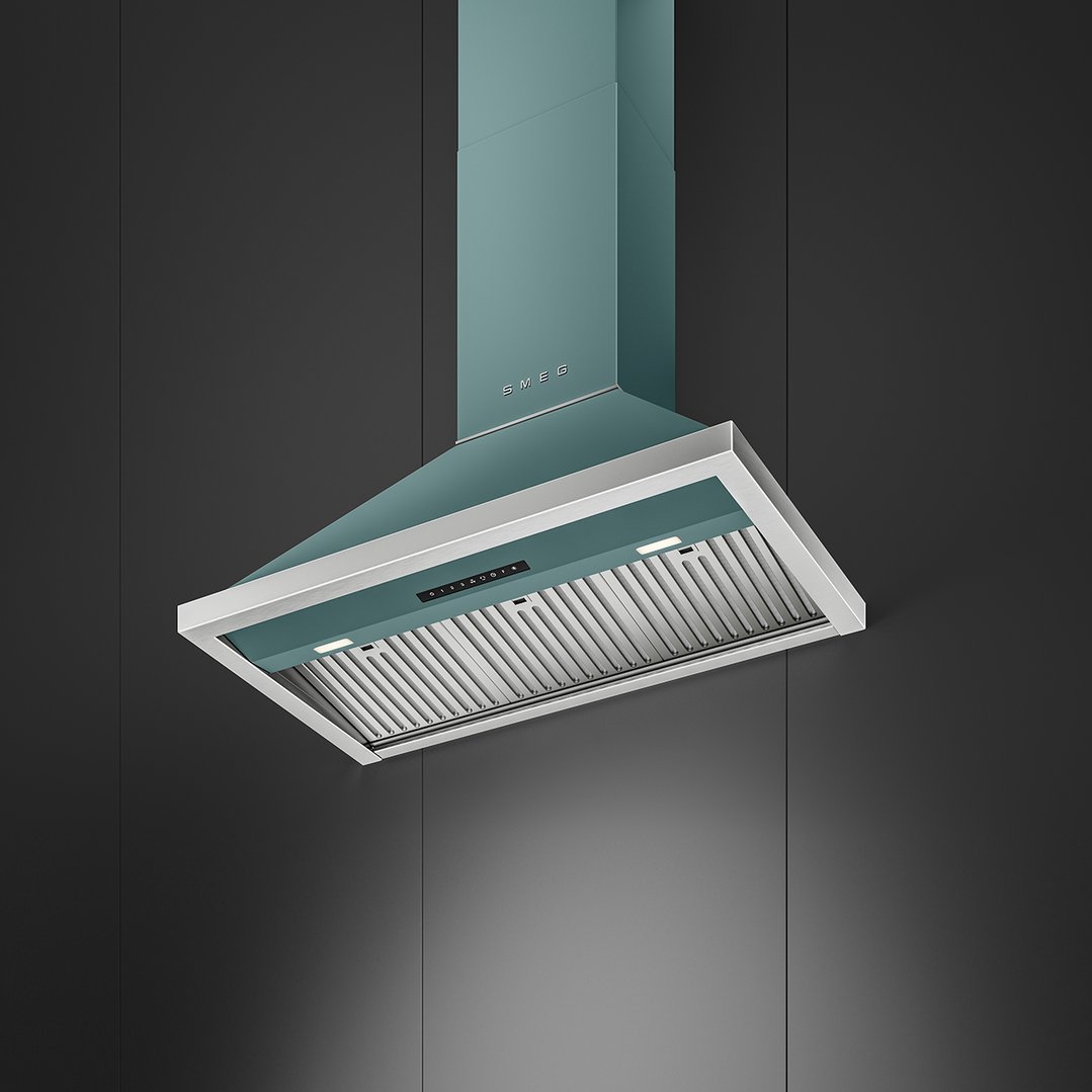Emerald green canopy rangehood with silver trim and controls against a dark wall