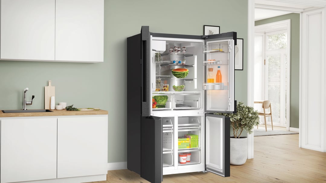Open Bosch Series 6 Multi Door Fridge Freezer in a modern kitchen setting