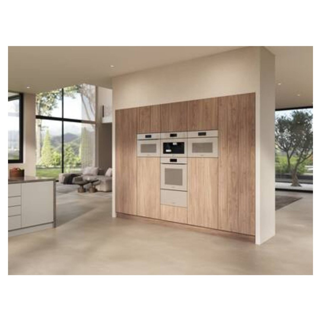 Built-in combination steam oven in a modern kitchen with wood cabinetry