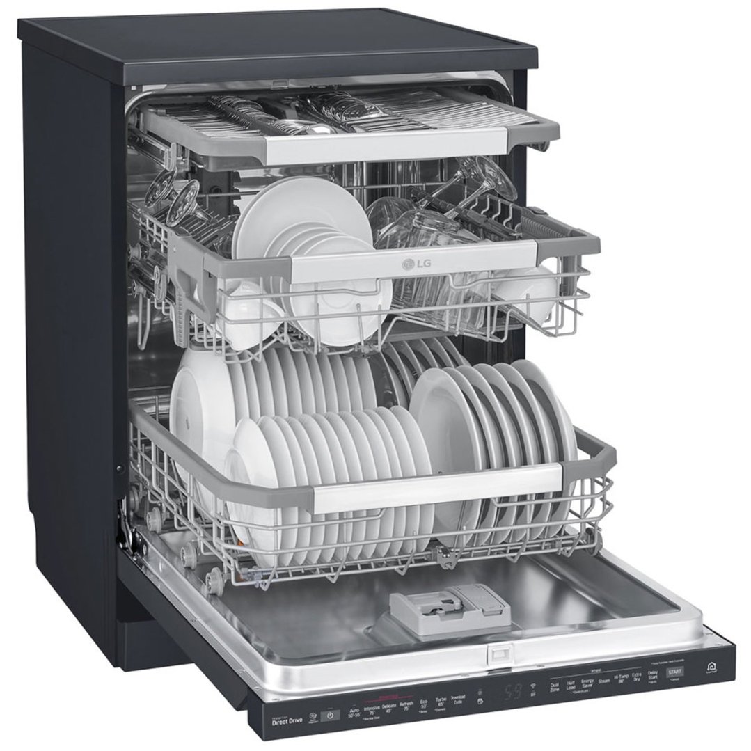 Open matte black dishwasher with dishes loaded in the racks