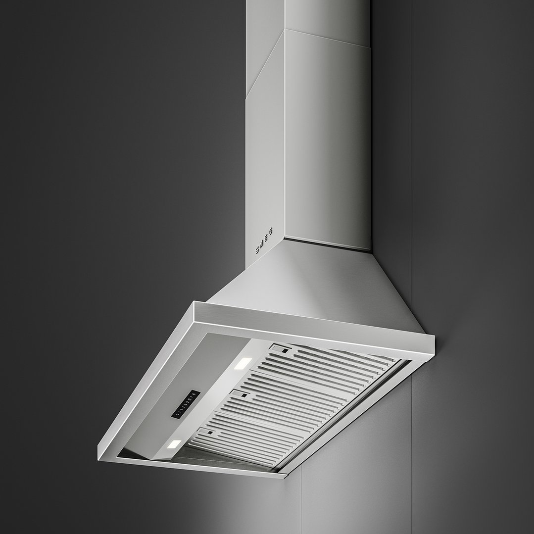 Stainless steel canopy rangehood mounted on a dark grey wall