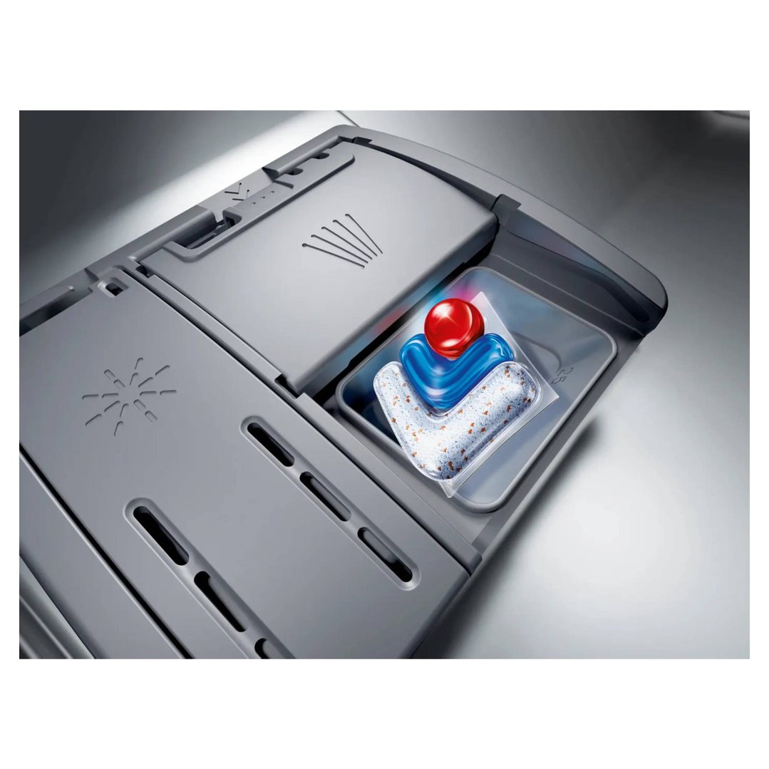 Dishwasher detergent pod in the dispenser of a dishwasher