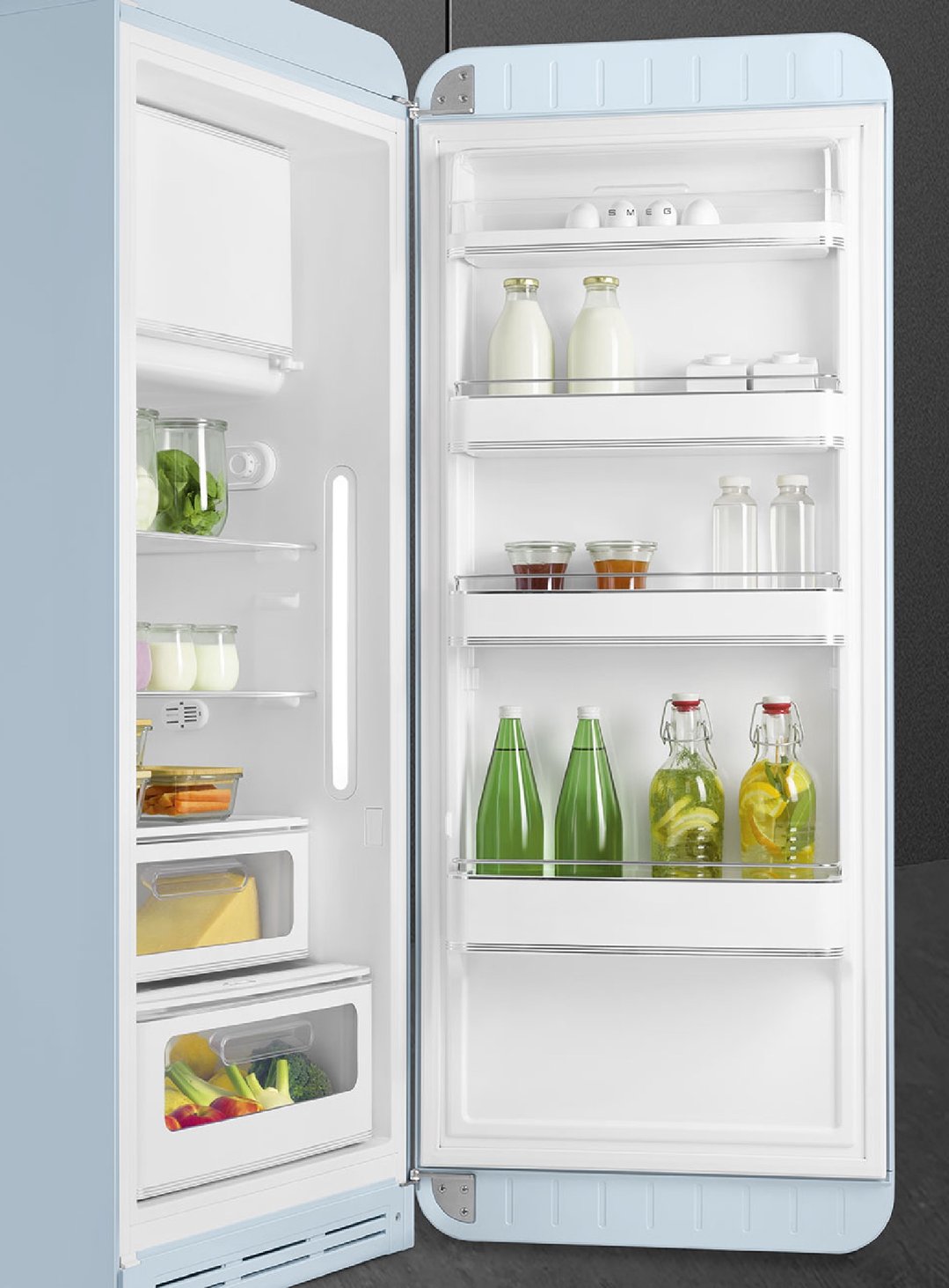 Open pastel blue refrigerator filled with food and drinks