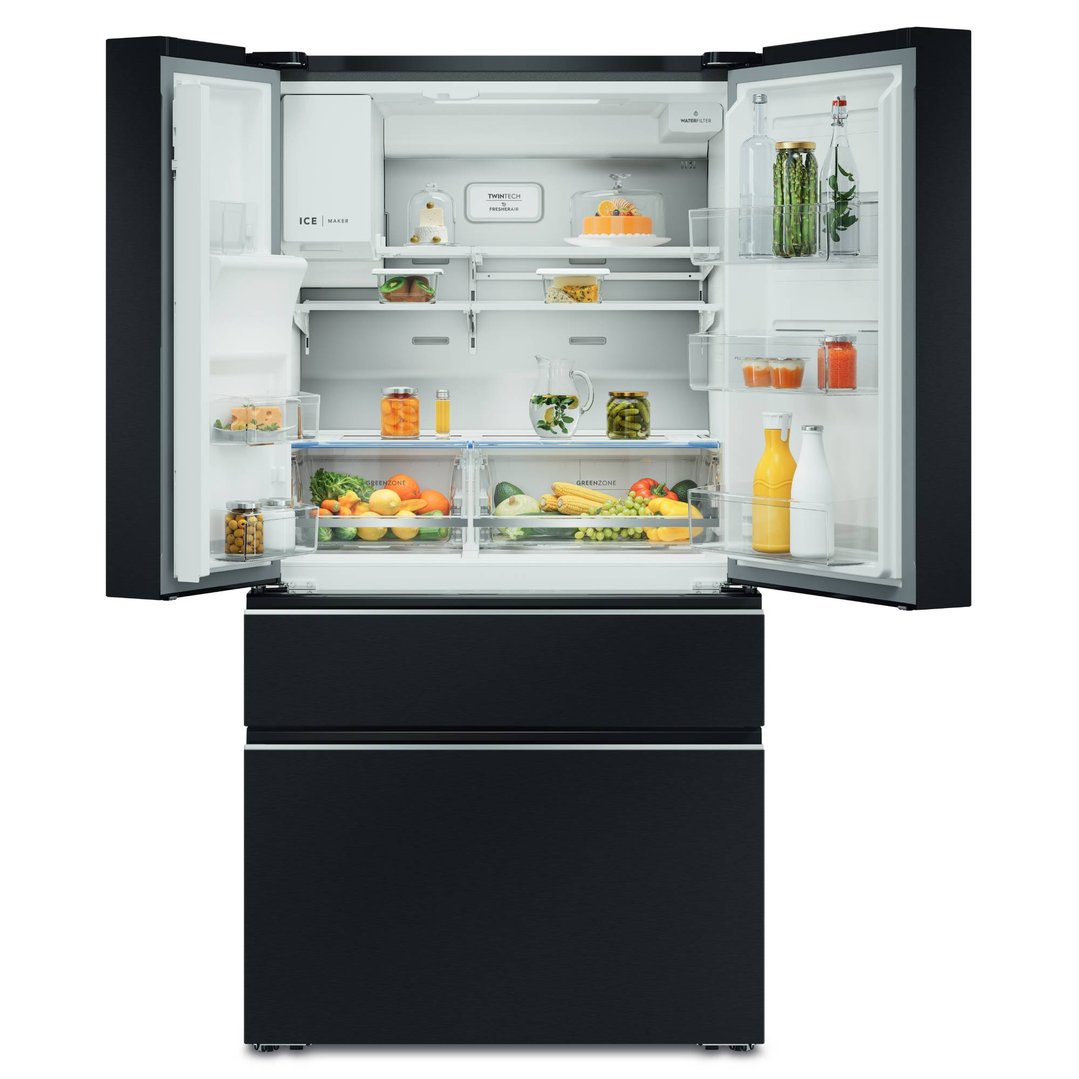 Open black French door fridge filled with food and drinks, front view
