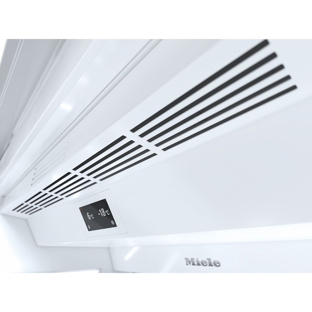 Close-up of the interior of a Miele fridge with temperature display