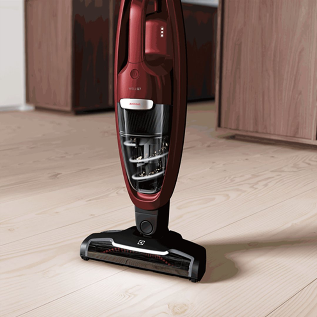Red Electrolux Well Q7 Animal Cordless Vacuum on a light wooden floor