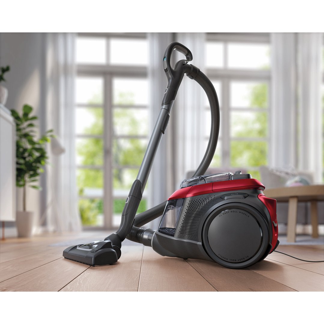 Red Electrolux Pure C9 Animal vacuum cleaner on a wooden floor