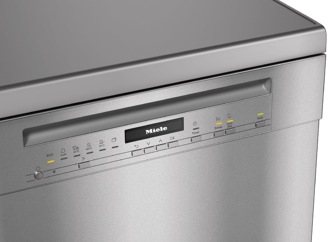 Close up of the control panel of a stainless steel Miele dishwasher