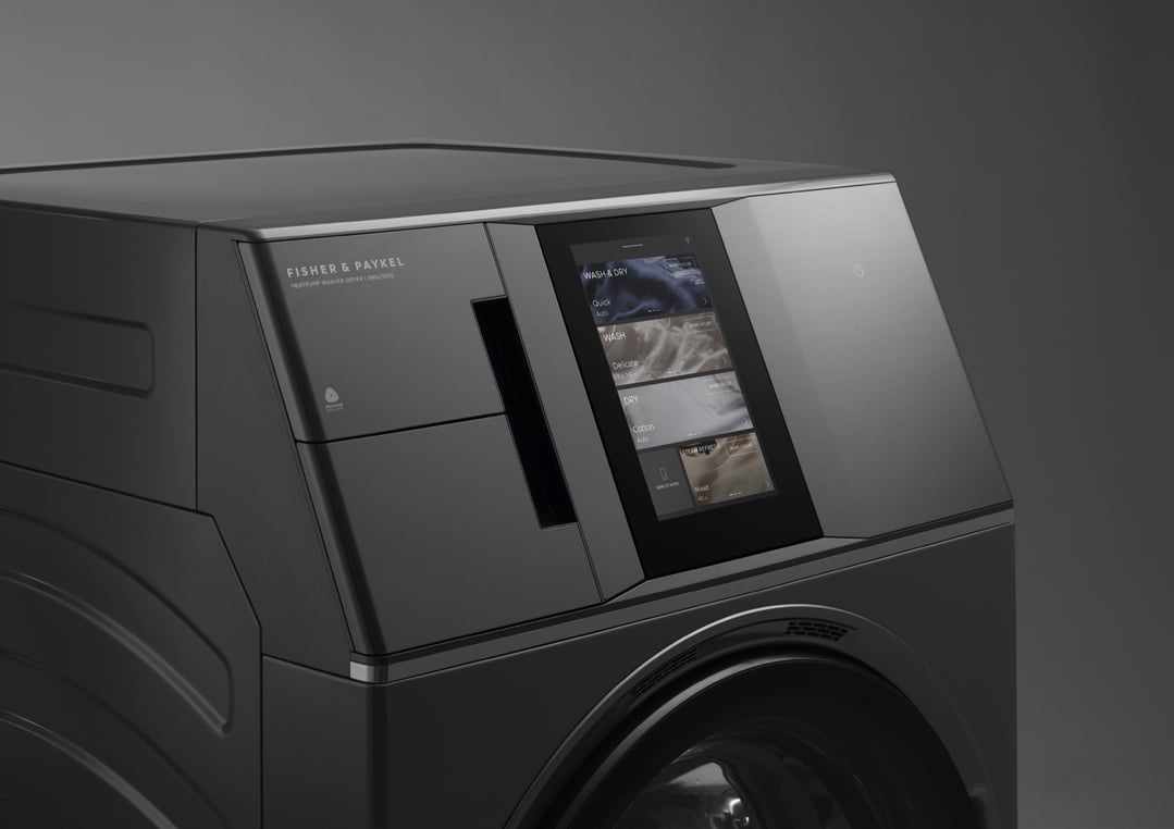 Close up of a dark washer dryer combo with a digital display
