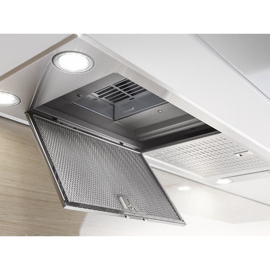 Close up of a built-in rangehood with a filter partially open