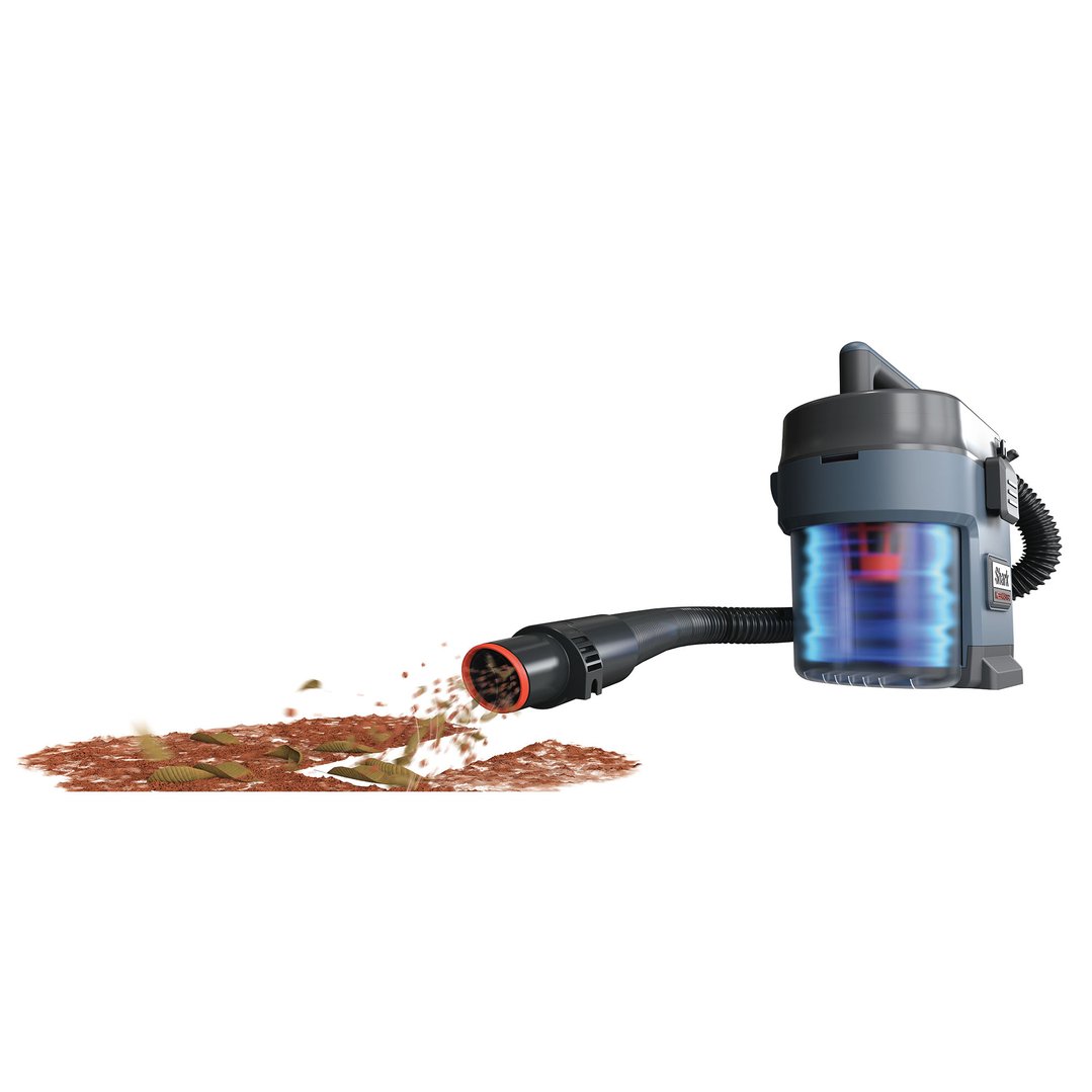 MessMaster portable wet/dry vacuum cleaning up dirt and debris on a white background