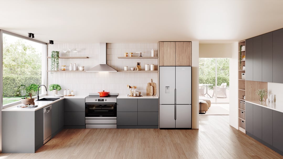 Freestanding oven with cooktop in a modern kitchen with a large window