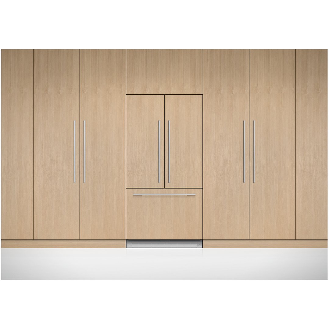 Integrated French Door Refrigerator Freezer built into light wood cabinetry