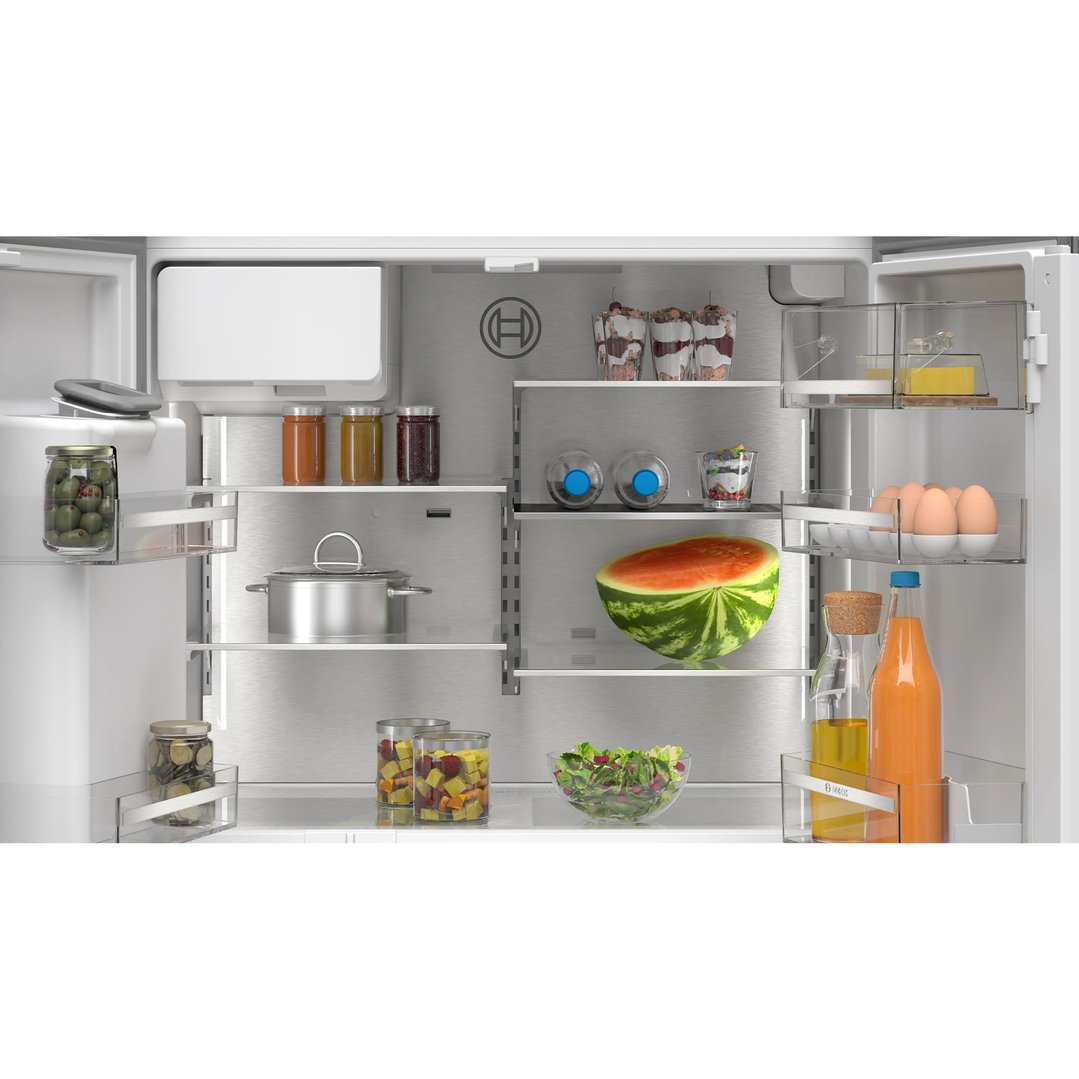 Interior view of a Bosch multi door fridge freezer filled with food