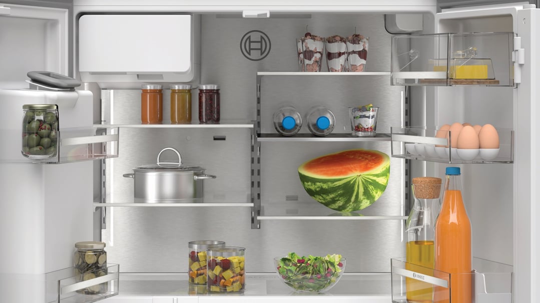 Open Bosch Multi Door Fridge Freezer filled with various food items