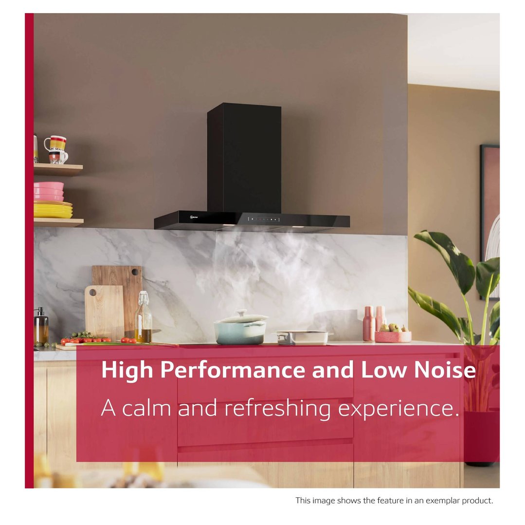 Black wall-mounted canopy rangehood in a kitchen with text overlay