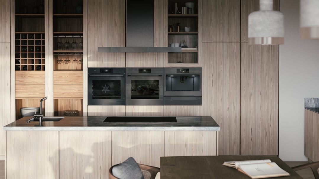 Built-in coffee machine, oven, and warming drawer in a modern kitchen with wooden cabinets