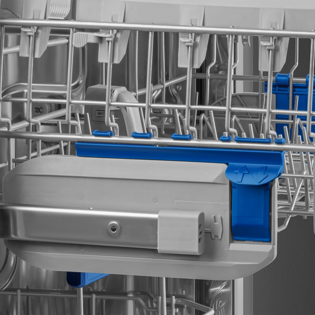 Close up of the interior rack of a dishwasher