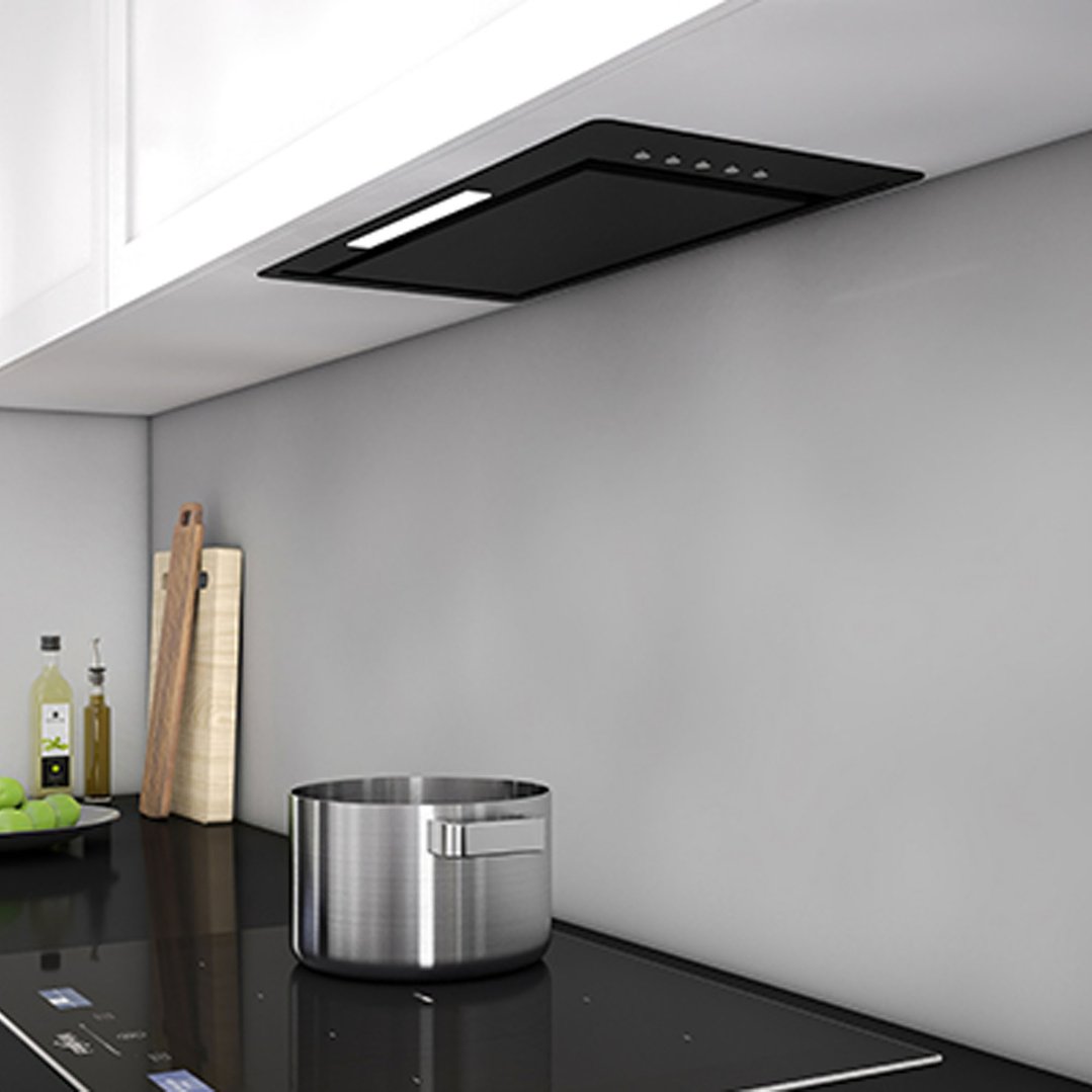 Black glass rangehood installed above a cooktop in a modern kitchen