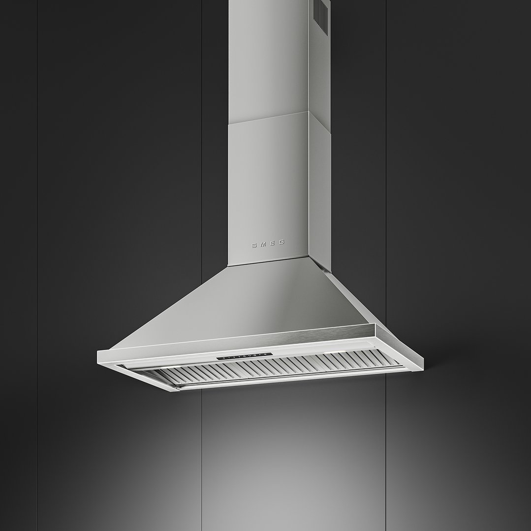 Stainless steel canopy rangehood mounted on a dark wall with a light reflection below