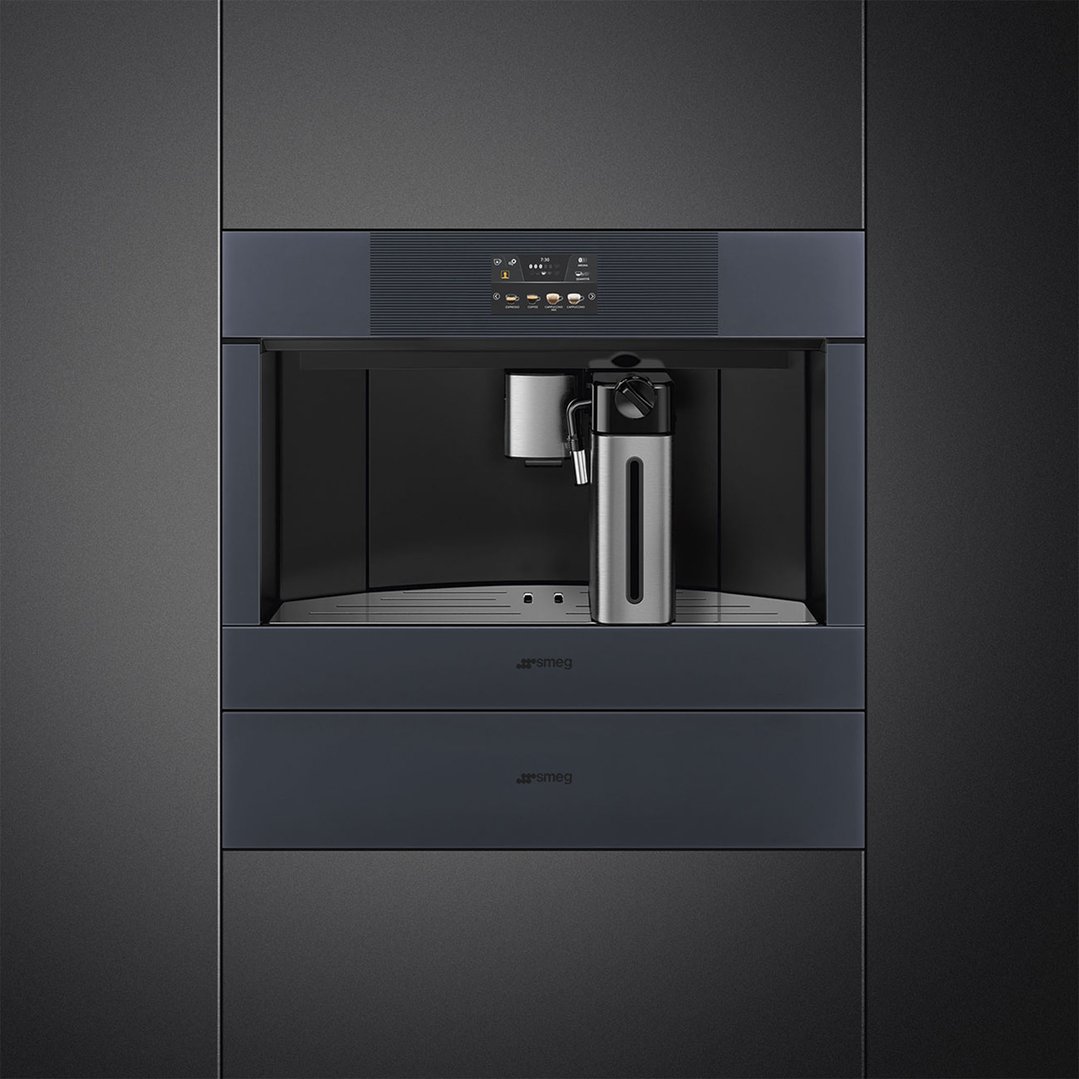 Built-in coffee machine in Neptune Grey, integrated into dark grey cabinetry