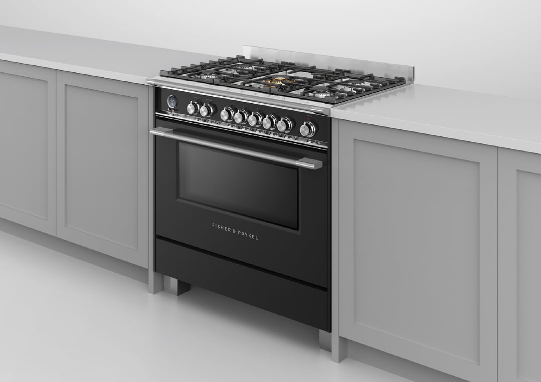 Black dual fuel pyrolytic cooker in a kitchen with light grey cabinets
