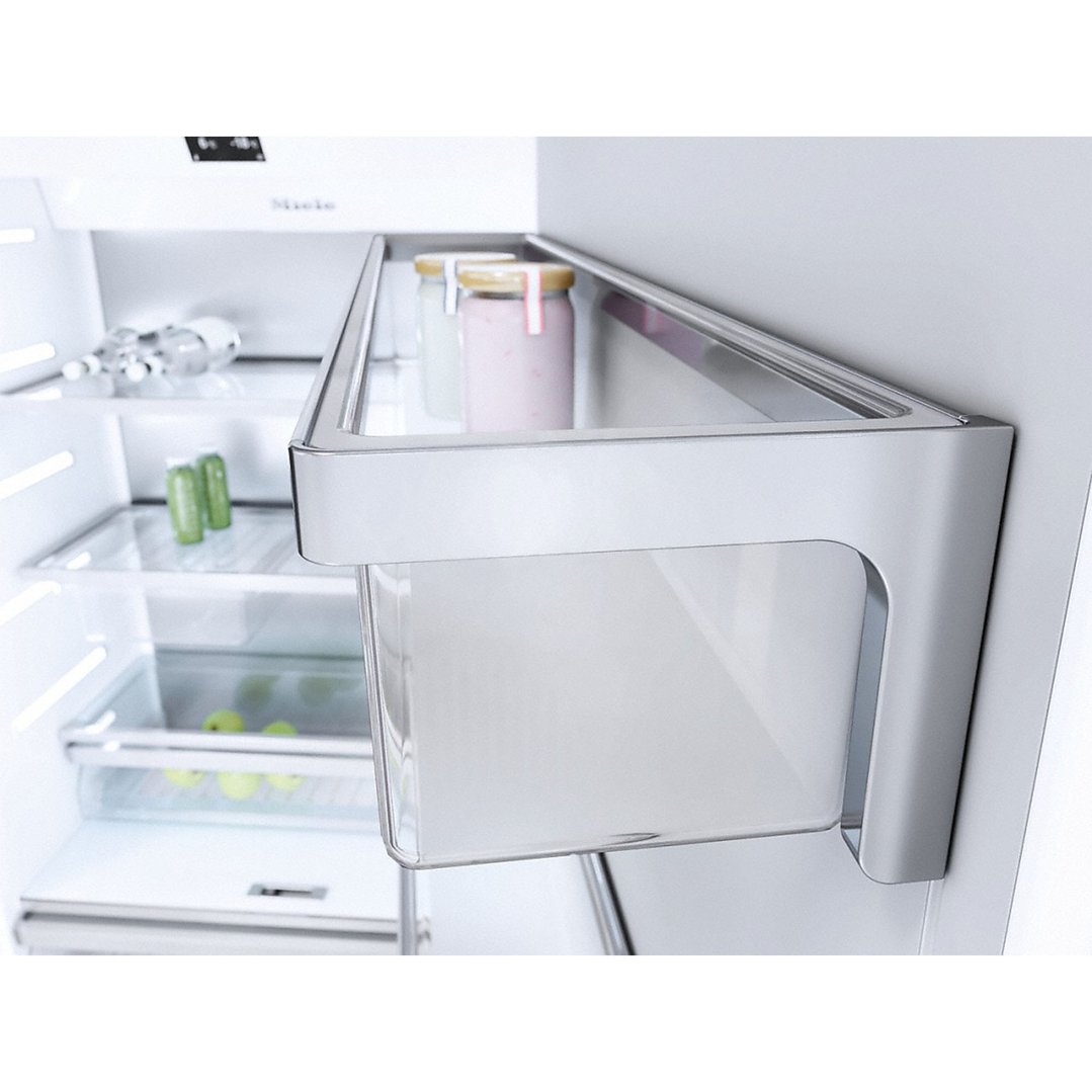 Interior of a Miele fridge with jars and bottles on shelves