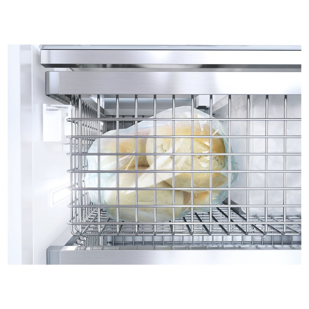Close up of a freezer drawer with a bag of bread inside