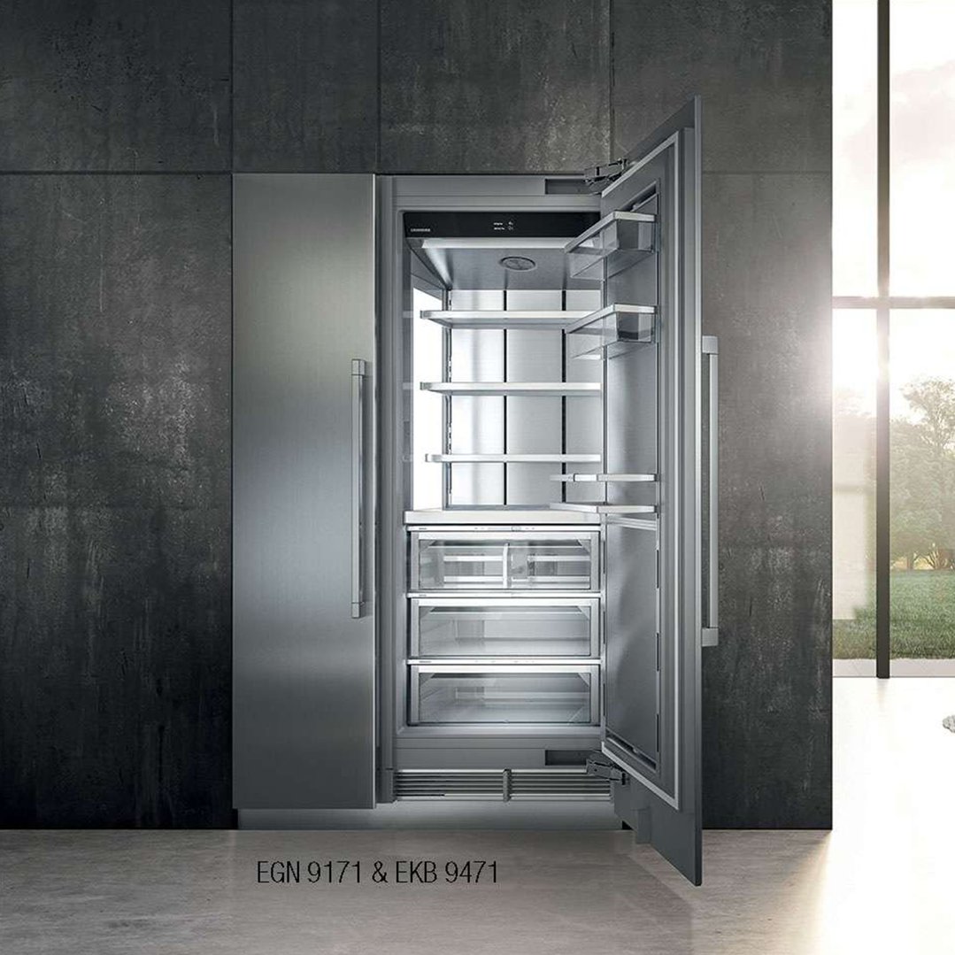 Open Liebherr Monolith fridge and freezer in a modern kitchen setting