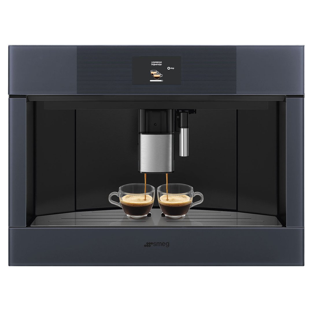 Built-in coffee machine dispensing espresso into two clear cups