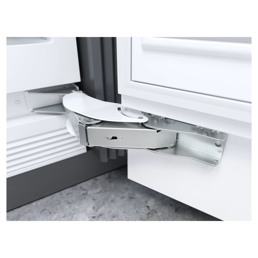 Close up of the hinge mechanism of a fully integrated freezer door