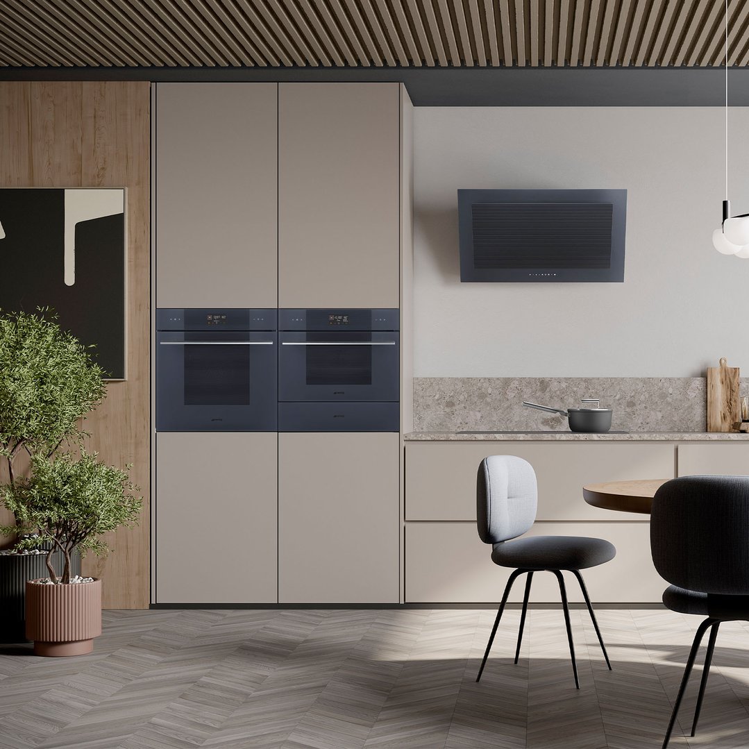 Two built-in compact speed ovens in a modern kitchen with dining area