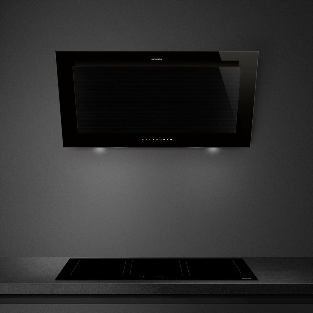 Black vertical rangehood and cooktop in a modern kitchen setting