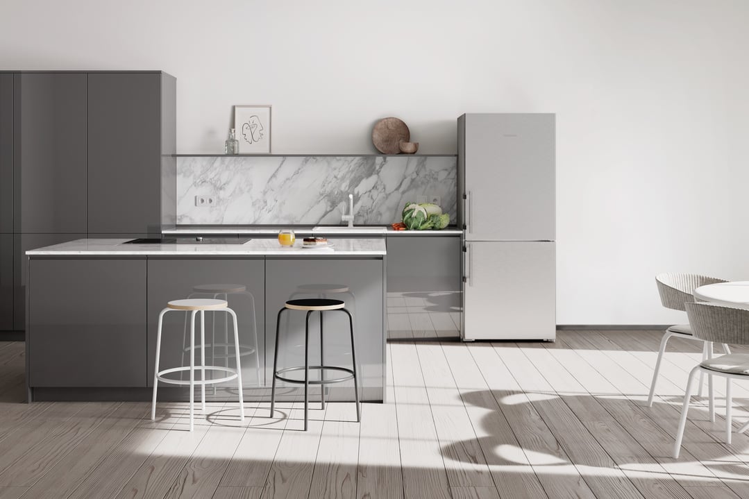 A Liebherr bottom mount fridge in a modern kitchen with an island bench