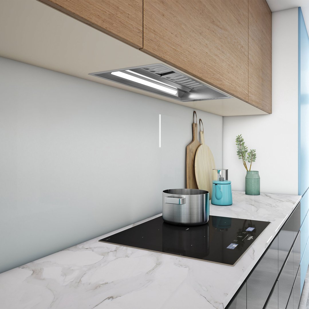 Rangehood installed above an induction cooktop in a modern kitchen setting