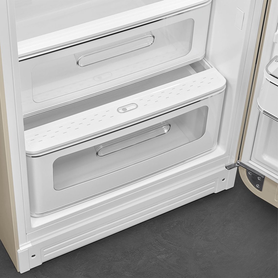 Interior view of a refrigerator showing clear drawers and shelves