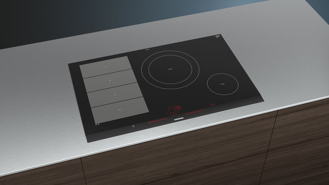 Black Siemens FlexInduction cooktop built into a grey countertop