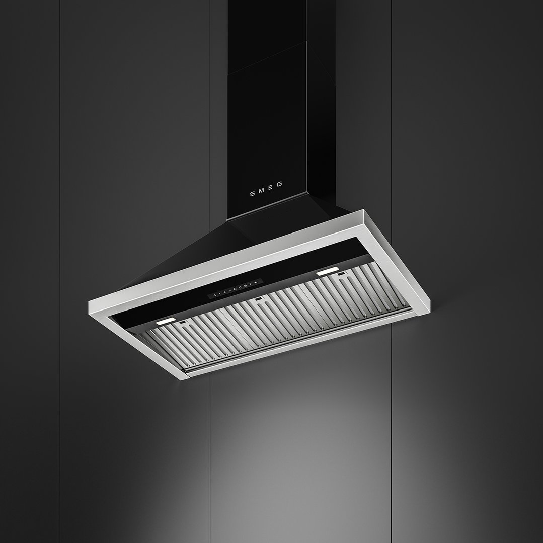 Black Smeg rangehood with silver trim mounted on a dark grey wall
