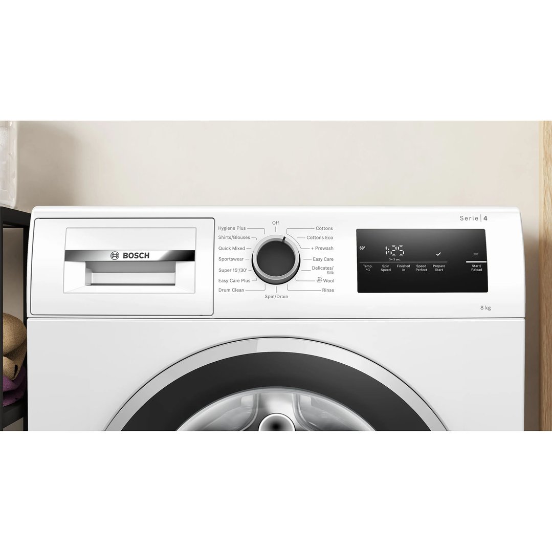 Close up of a white Bosch washing machine control panel and door
