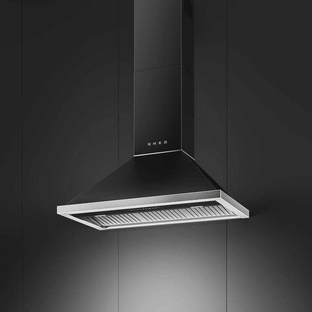 Black SMEG rangehood mounted on a dark wall in a modern kitchen