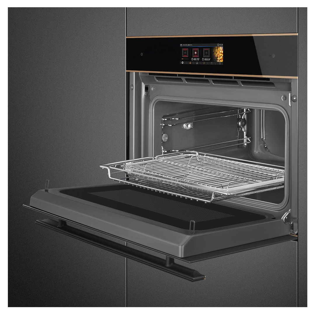 Open built-in microwave oven with a metal rack and tray inside