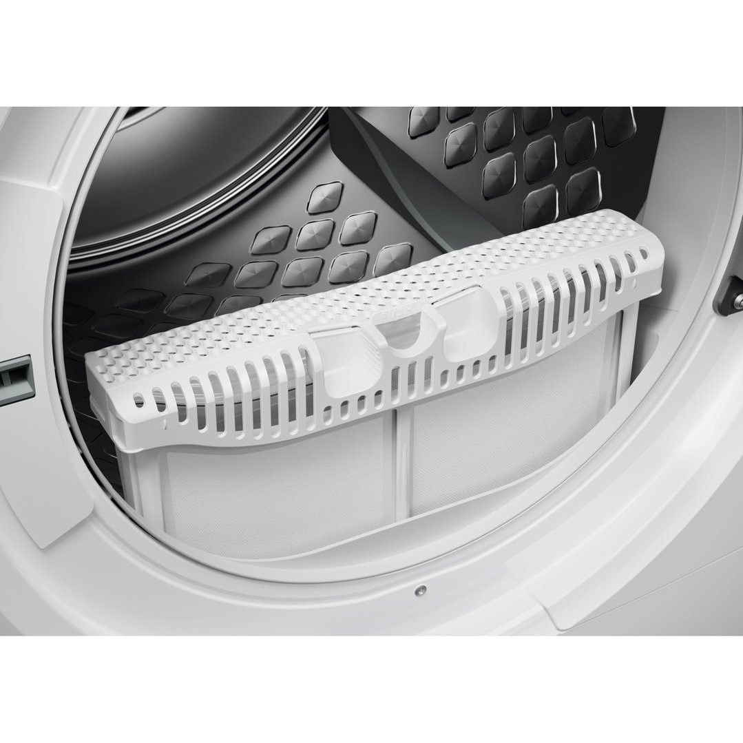 Close up of a dryer's lint filter and drum interior